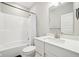Compact bathroom features modern fixtures, quartz counters, and a shower-tub combination at 2156 W 171St St, Westfield, IN 46074