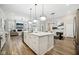Open kitchen design with island seating and connecting to the living room at 2156 W 171St St, Westfield, IN 46074