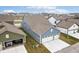 Aerial view of a two-car garage with a long driveway in a residential neighborhood at 2156 W 171St St, Westfield, IN 46074