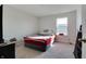 Bedroom with carpet and bright natural light, creating a welcoming and peaceful retreat at 2208 Gambel Ln, Danville, IN 46122