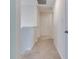 Upstairs hallway with carpet and white trim, and several doors leading to rooms at 2208 Gambel Ln, Danville, IN 46122