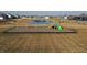 Community playground area, complete with slide and other play equipment, near walking trail and pond at 2208 Gambel Ln, Danville, IN 46122