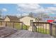 View of the detached garage and backyard from the wood deck of the house at 2620 Central Ave, Indianapolis, IN 46205