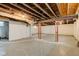 Unfinished basement with exposed ceiling, concrete floor, and support beams at 2620 Central Ave, Indianapolis, IN 46205