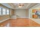 Well-lit dining area with hardwood floors and open access to the kitchen at 2620 Central Ave, Indianapolis, IN 46205
