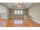Inviting dining room with hardwood floors, bright windows, and neutral decor at 2620 Central Ave, Indianapolis, IN 46205