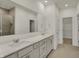 Bathroom features a double sink vanity, large mirrors, and a glass-enclosed shower stall at 268 Onset Way, Westfield, IN 46074