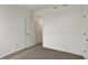 Cozy bedroom featuring neutral carpet and a doorway providing a glimpse into another room at 268 Onset Way, Westfield, IN 46074