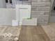 Selection of finishes including flooring, cabinet door, countertop, and brick facade at 268 Onset Way, Westfield, IN 46074