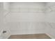 Walk-in closet features carpet flooring, and wire shelving for plenty of storage and organization at 268 Onset Way, Westfield, IN 46074