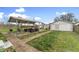 Backyard featuring patio, shed and potential for various activities at 2709 S Mcclure St, Indianapolis, IN 46241