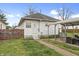The backyard features a small patio and a grassy area at 2709 S Mcclure St, Indianapolis, IN 46241