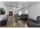 Bright living room with a comfortable sofa and a dining area, great for entertaining at 2709 S Mcclure St, Indianapolis, IN 46241