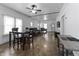 Open-concept space combining the dining and living areas, filled with natural light at 2709 S Mcclure St, Indianapolis, IN 46241