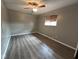Bedroom with natural light from window and sleek wood-look flooring at 2765 Del Prado Dr # 7, Indianapolis, IN 46227