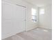 Bright bedroom featuring a large closet and a window view at 3308 Morab Dr, Zionsville, IN 46077