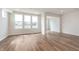 Large living room featuring hardwood floors, bright windows, and a modern, open layout at 3308 Morab Dr, Zionsville, IN 46077