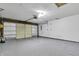 Clean and spacious garage with painted floor, overhead lighting, and garage door at 3701 Dorval Pl, Indianapolis, IN 46228