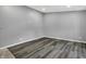 Spacious living room with hardwood floors and neutral paint at 3701 Dorval Pl, Indianapolis, IN 46228