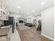 Spacious basement with a kitchenette, home gym, and seating area for relaxing or entertaining at 3998 Jonathan Rdg, Columbus, IN 47201