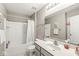 Full bathroom with shower-tub combination, white shower curtain, and a sink vanity with a large mirror at 3998 Jonathan Rdg, Columbus, IN 47201