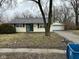 Charming ranch-style home with a well-maintained yard and detached garage at 4047 Biscayne Rd, Indianapolis, IN 46226