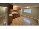 Kitchen featuring wooden cabinets and a stainless steel sink at 4047 Biscayne Rd, Indianapolis, IN 46226