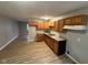 Kitchen featuring wooden cabinets and a stainless steel sink at 4047 Biscayne Rd, Indianapolis, IN 46226