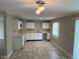 Kitchen featuring modern lighting, ample counter space, and a large sink, perfect for cooking and entertaining at 4224 N Arlington Ave, Indianapolis, IN 46226