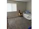 Serene bedroom with neutral walls, soft carpet, and natural light at 4480 Village Ln # 2, Indianapolis, IN 46254