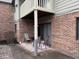 Private patio area with seating, perfect for relaxing and enjoying the outdoors at 4480 Village Ln # 2, Indianapolis, IN 46254