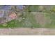 Aerial view of a well-maintained property with a large green lawn at 4935 W Carriage Dr, New Palestine, IN 46163