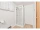 Bathroom featuring a modern glass-enclosed shower stall with updated fixtures at 4935 W Carriage Dr, New Palestine, IN 46163