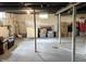 Spacious unfinished basement with concrete floor and exposed ceiling, offering potential for customization at 5368 Southeastern Ave, Indianapolis, IN 46203