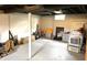 Unfinished basement featuring concrete floor, cinderblock walls and overhead utilities at 5368 Southeastern Ave, Indianapolis, IN 46203