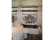 Bathroom with a patterned shower curtain and tiled floor at 5437 Powder River Ct, Indianapolis, IN 46221