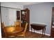 Dining room featuring a round table with wooden chairs and hardwood floors at 5437 Powder River Ct, Indianapolis, IN 46221