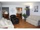 Spacious living room with hardwood floors and sofas at 5437 Powder River Ct, Indianapolis, IN 46221