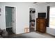 This main bedroom features neutral walls, a closet, and attached bath at 5437 Powder River Ct, Indianapolis, IN 46221