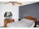 Inviting main bedroom with a decorative mirror and a complementary color scheme and design at 5437 Powder River Ct, Indianapolis, IN 46221