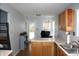 Cozy workspace area with white cabinets and countertops, offering a functional and organized environment at 5437 Powder River Ct, Indianapolis, IN 46221