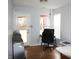 Comfortable office featuring a door and window access to the outside, perfect for a home workspace at 5437 Powder River Ct, Indianapolis, IN 46221