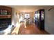 Dining room with hardwood floors, natural light, chandelier and a decorative china cabinet at 5819 Bar Del E Dr, Indianapolis, IN 46221