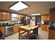 Well-lit kitchen with stainless steel appliances, butcher block center island and plenty of counter space at 5819 Bar Del E Dr, Indianapolis, IN 46221