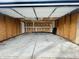 Spacious, unfinished garage space with concrete floors and ample room for storage at 6640 Manassas Dr, Indianapolis, IN 46241