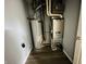 Mechanical room featuring new furnace and hot water heater at 6640 Manassas Dr, Indianapolis, IN 46241