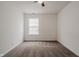 Bedroom with a ceiling fan and natural light coming in through the window at 7352 Crickwood Pl, Indianapolis, IN 46268