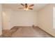 Bedroom featuring a ceiling fan, neutral walls, carpet and window with natural light at 7352 Crickwood Pl, Indianapolis, IN 46268