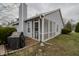 Cozy screened porch addition enhances outdoor living space, perfect for relaxation and entertaining at 7352 Crickwood Pl, Indianapolis, IN 46268