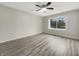Bright bedroom featuring hard wood floors and a window, providing ample natural light at 7850 Park North Bnd, Indianapolis, IN 46260